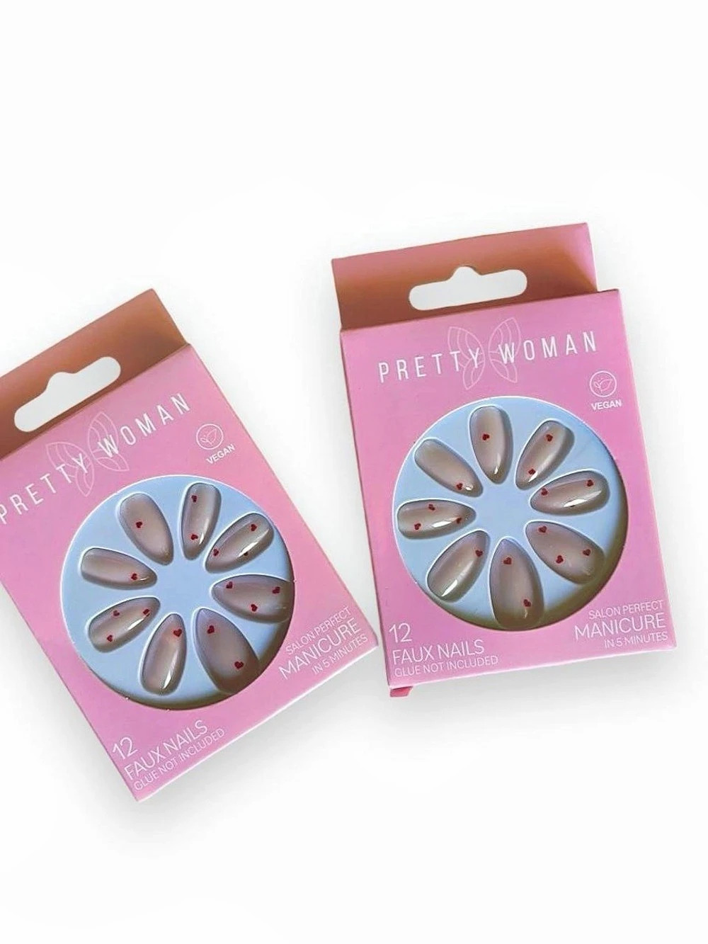 almond nude press on nails with tiny red heart details - set of two